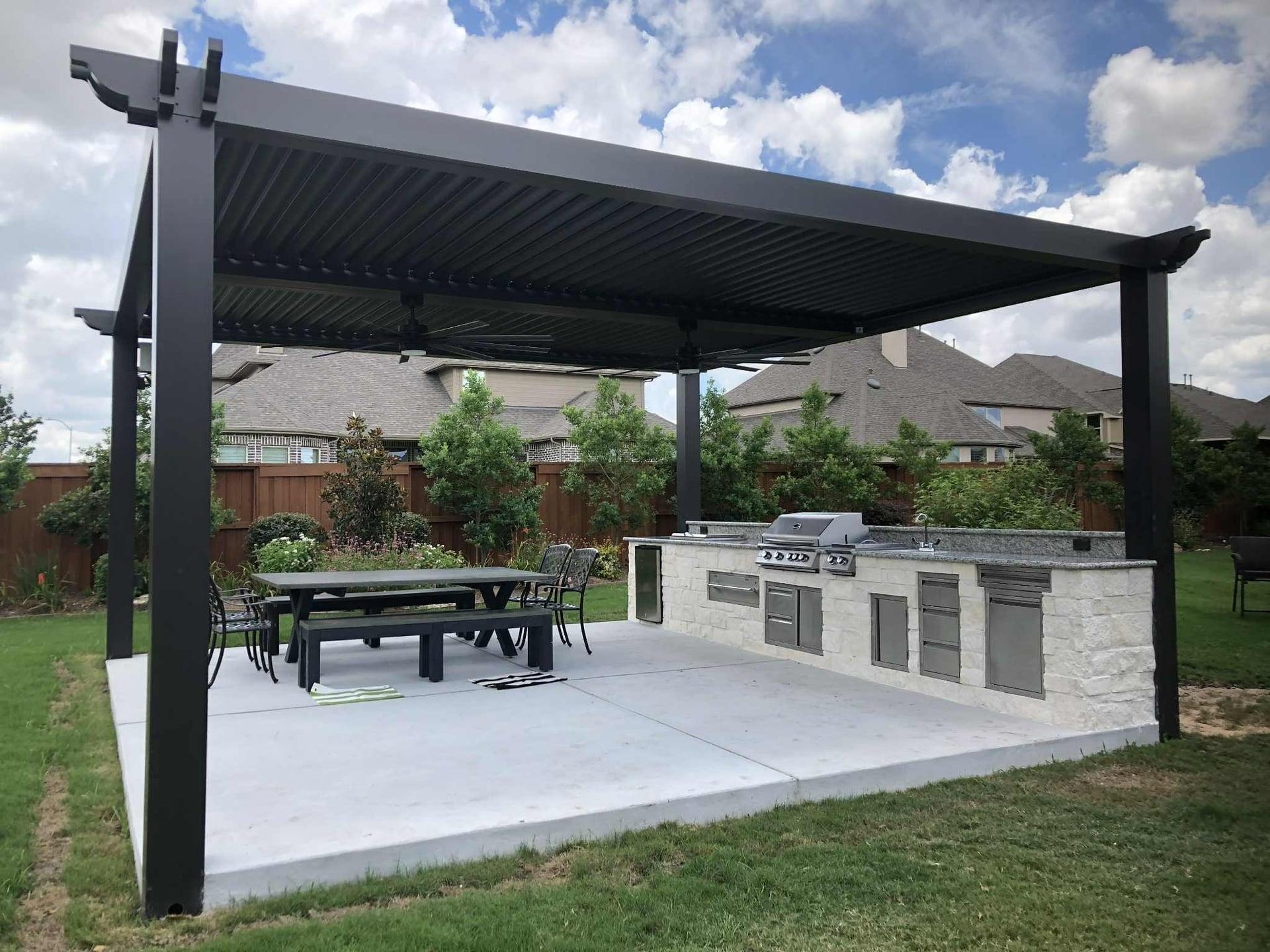 Modern louvered pergola over dining area and outdoor kitchen